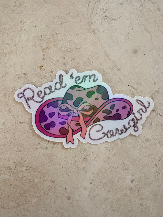 Read 'em Cowgirl bookish sticker featuring a colorful leopard print cowgirl hat.