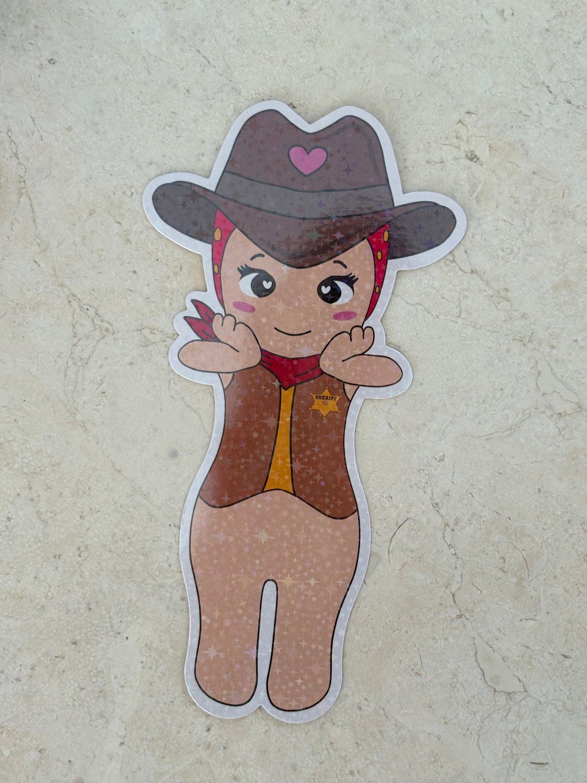 Cute chibi cowgirl sheriff sticker with a brown hat and star badge